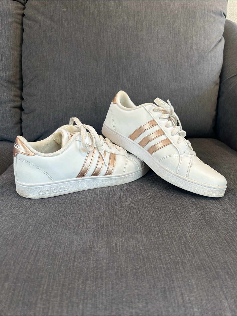 Adidas white and rose gold sneakers with rose gold stripes